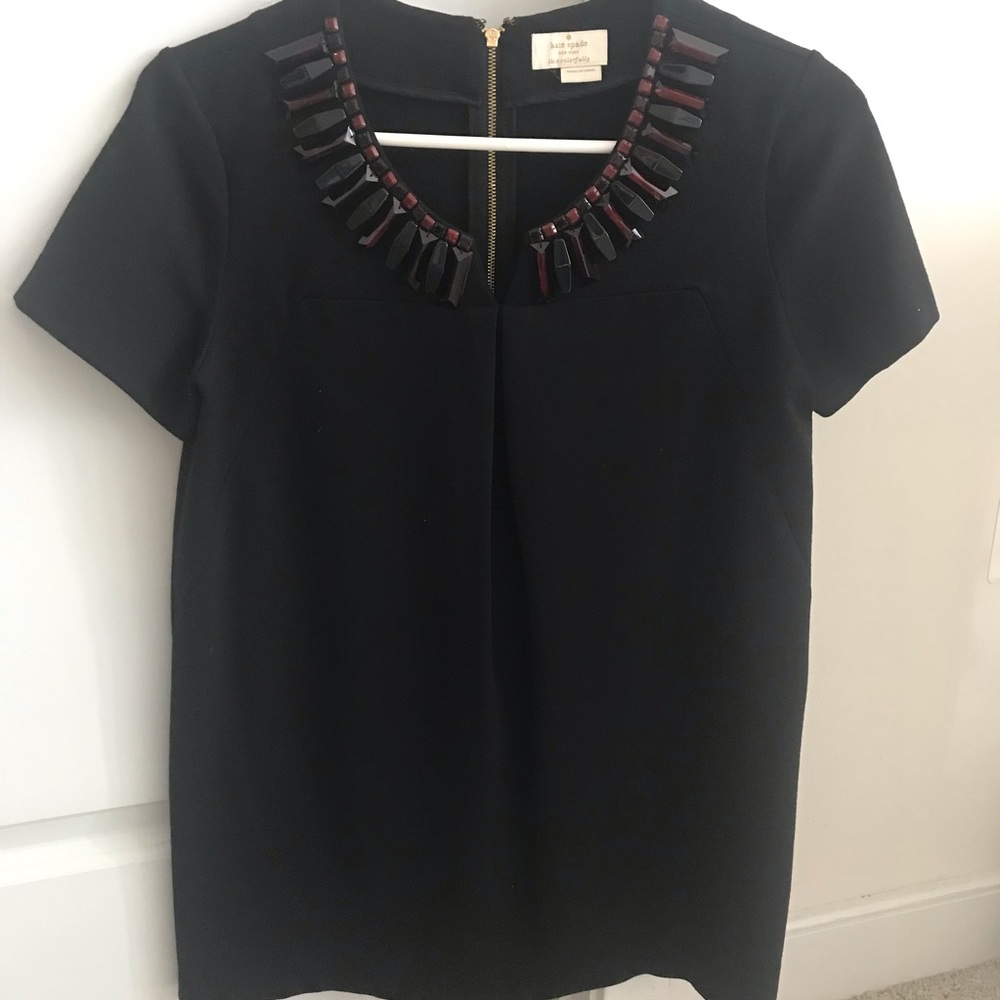 Black Kate Spade top with statement neckline